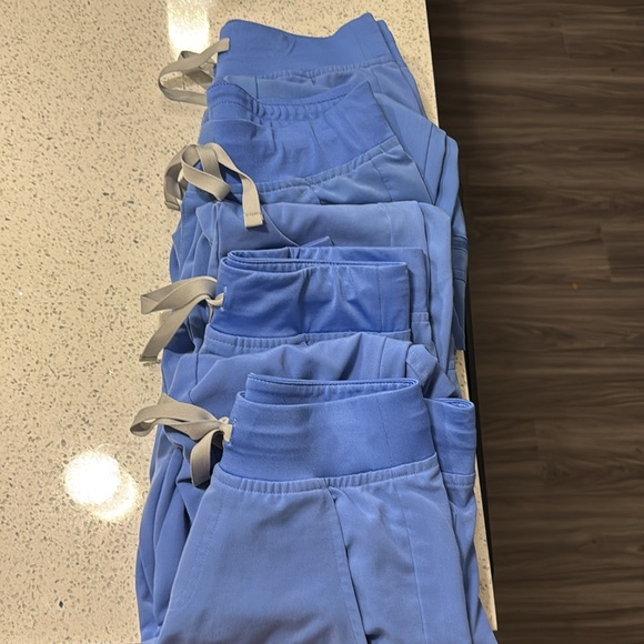 Figs scrub bottoms, 4 of them in total $25 each; price is listed for 4 in total. - Picture 1 of 10